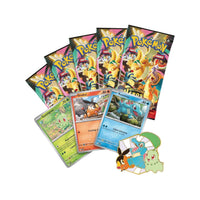 Contenu du coffret Pin's Héros Transcendants en français : 5 boosters, cartes Germignon, Gruikui, Kaiminus et le pin's